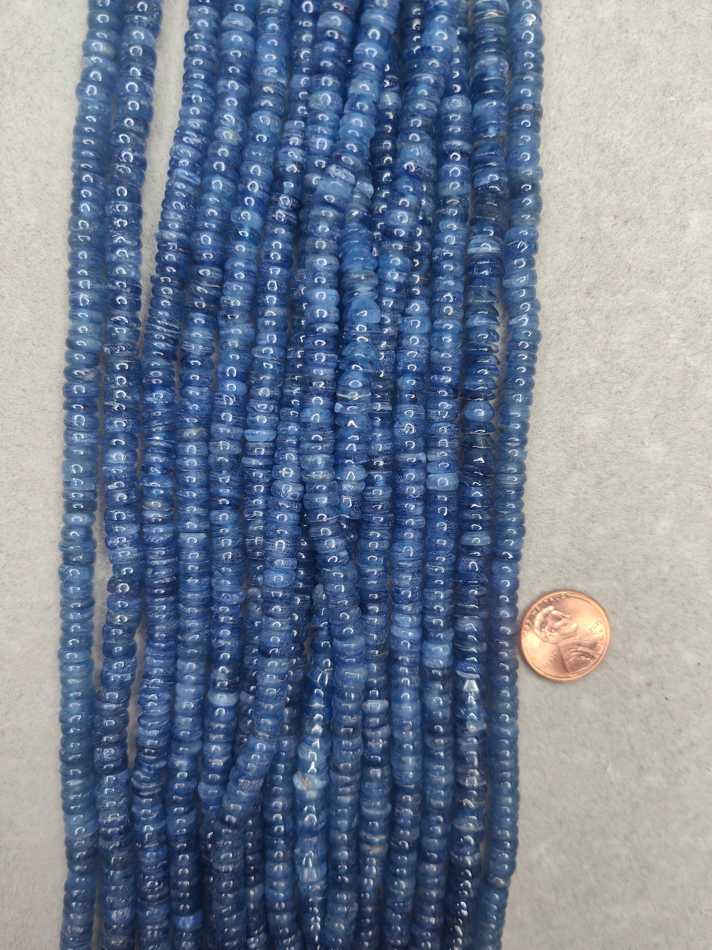 kyanite 4mmx7mm rondelle AA grade 16"strand