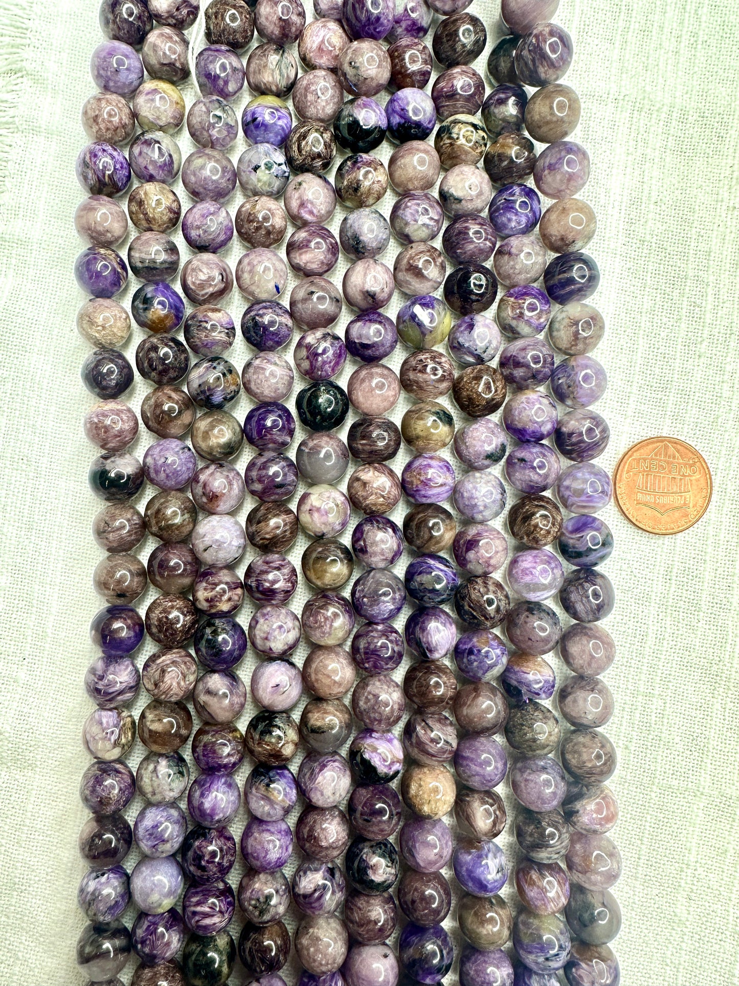 charoite round 10mm AB grade 16"strand