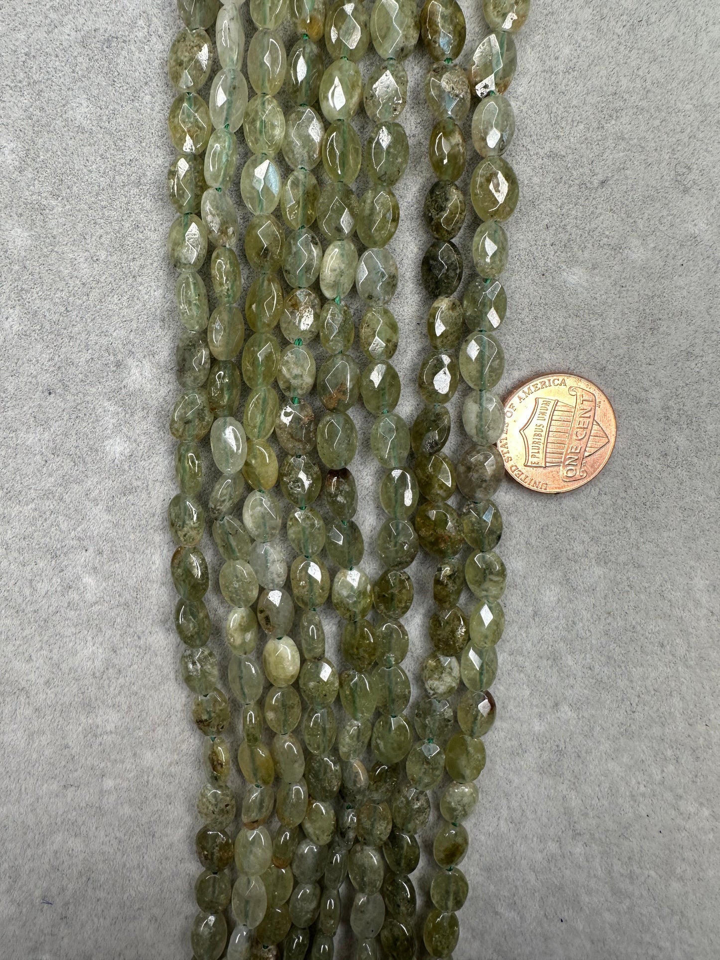 green garnet oval faceted 11mmx15mm 15.5" strand