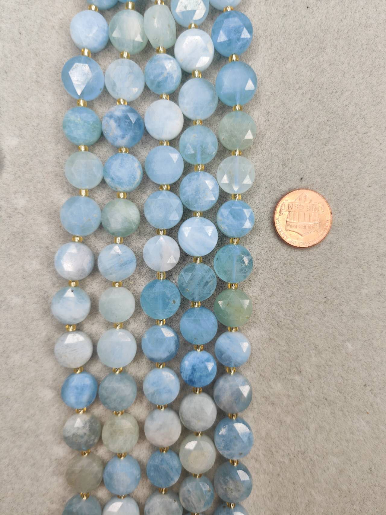 aquamarine faceted coin shape 12mm 16"strand