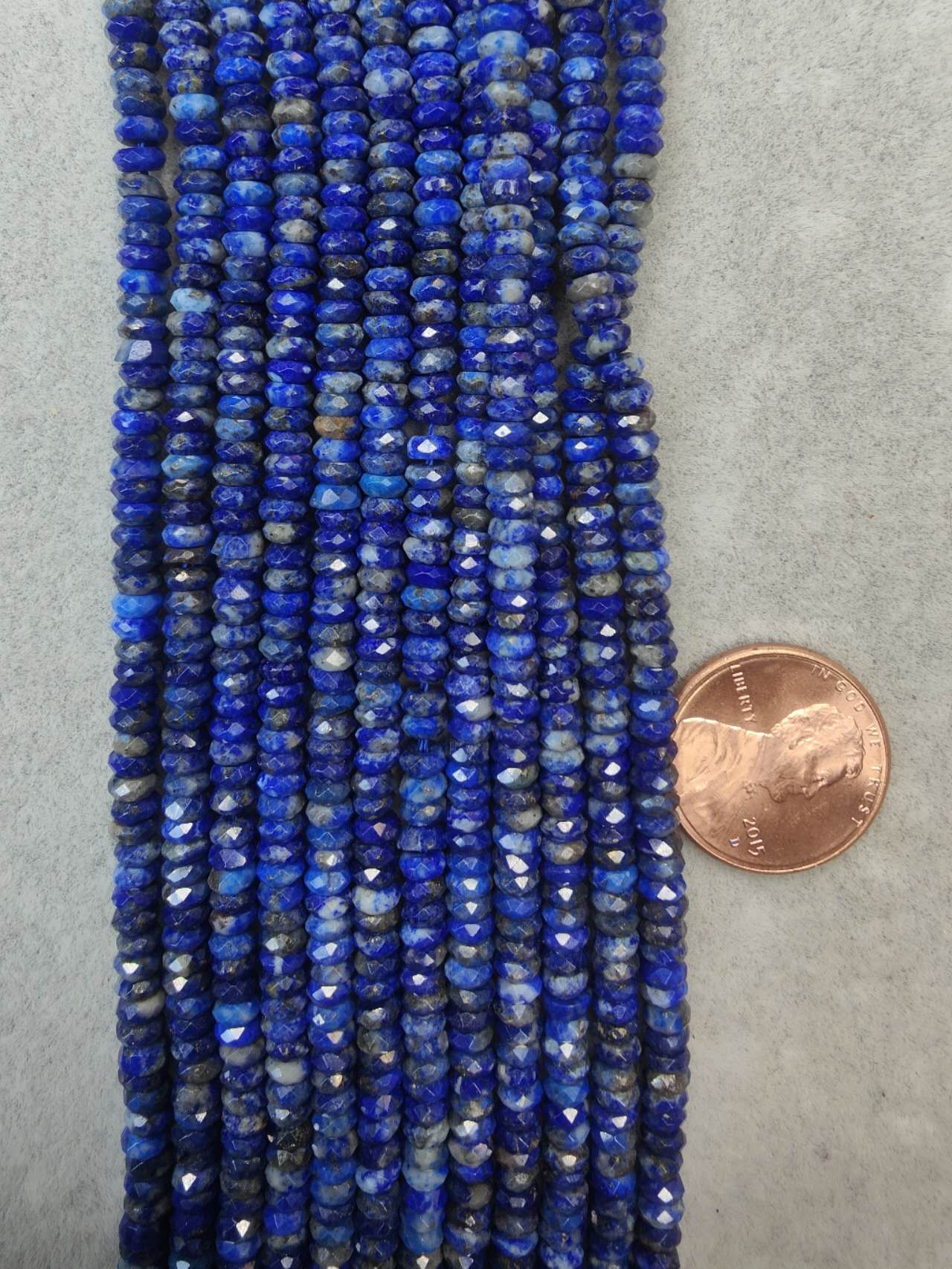 lapis lazuli 2mmx4mm rondelle faceted  16"strand