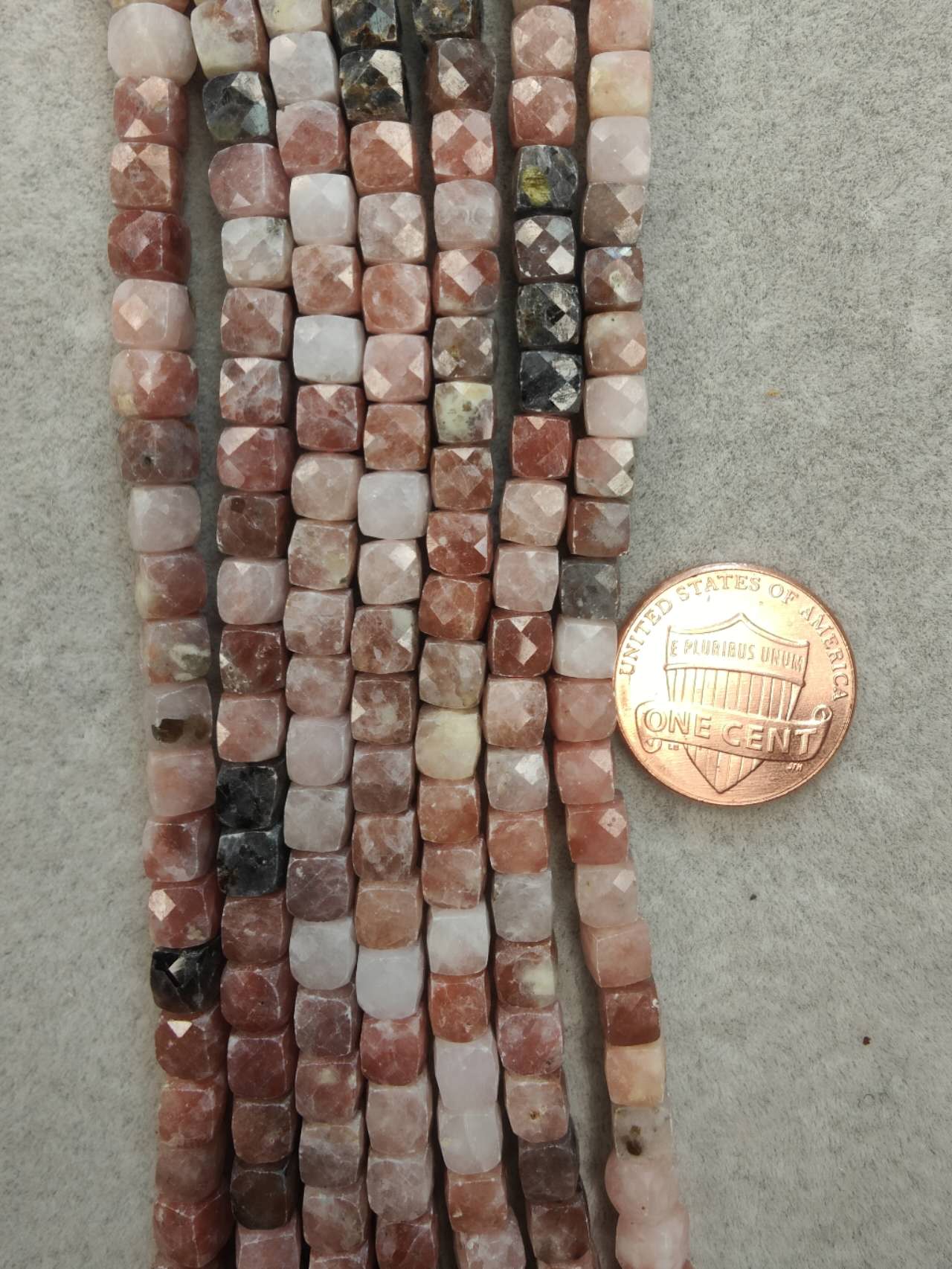 rhodochrosite faceted cube 5mm 16"strand