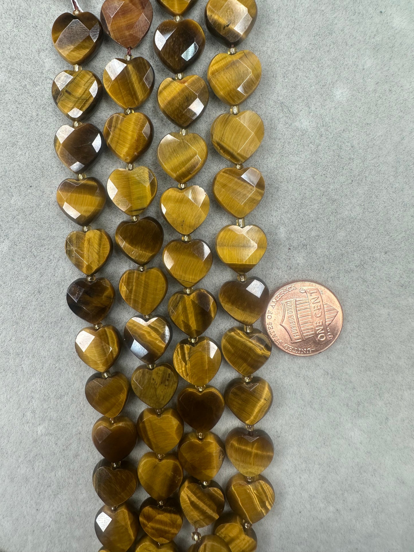 tiger's eye heart faceted 12mm 16"strand