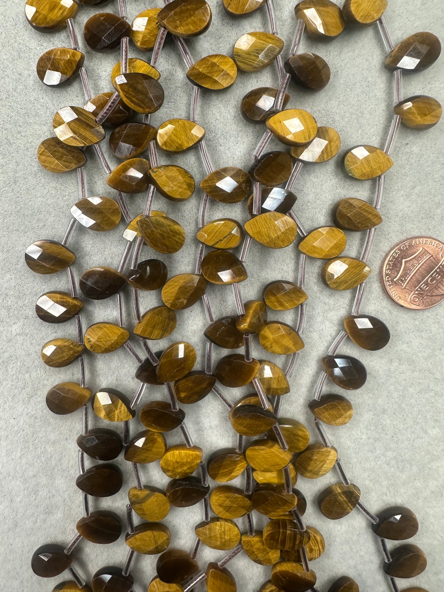 tiger's eye teardorp faceted top drilled 8mmx12mm 16"strand