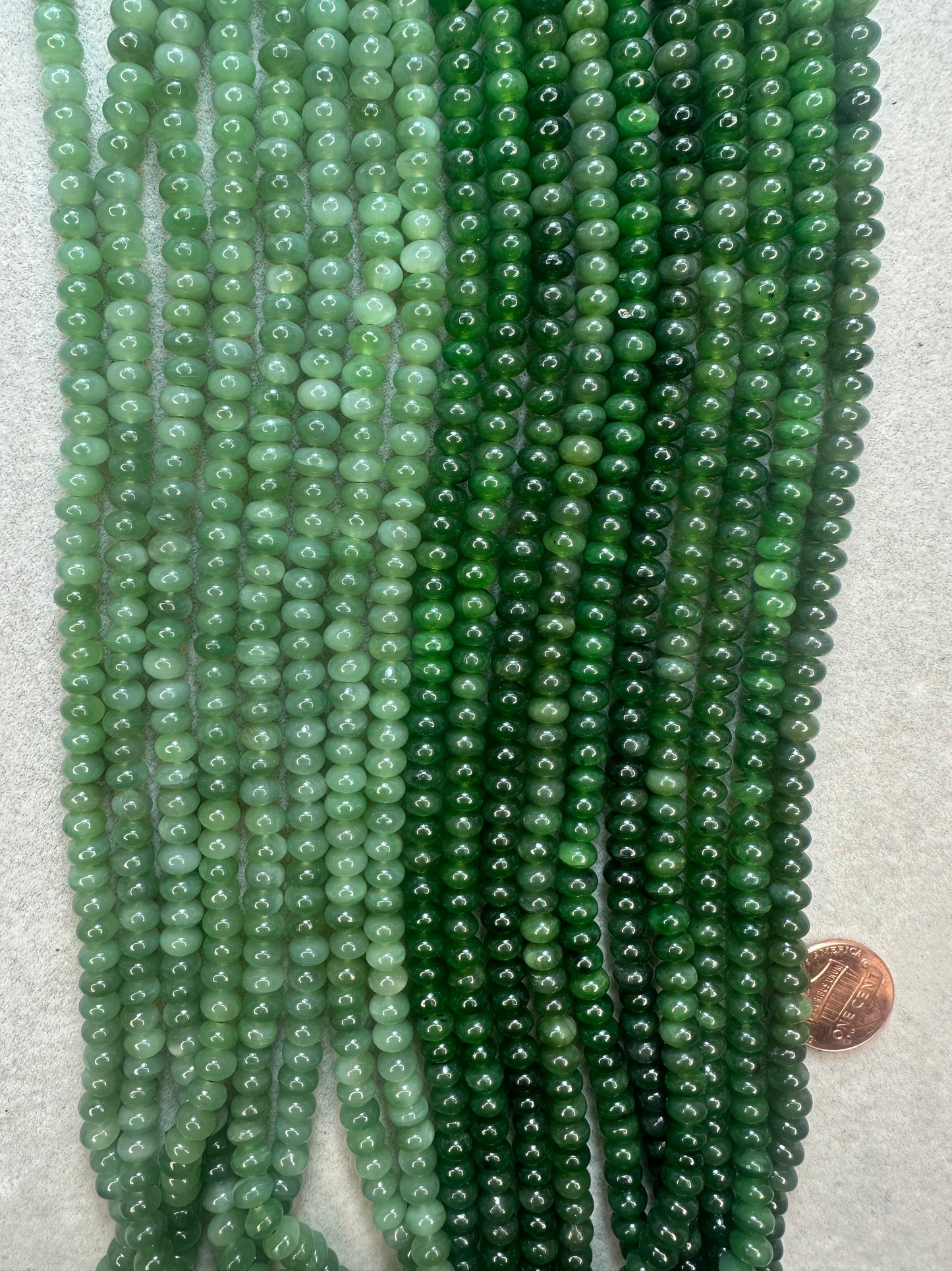 canadian jade 4mmx7mm rondelle AAA grade 16"strand