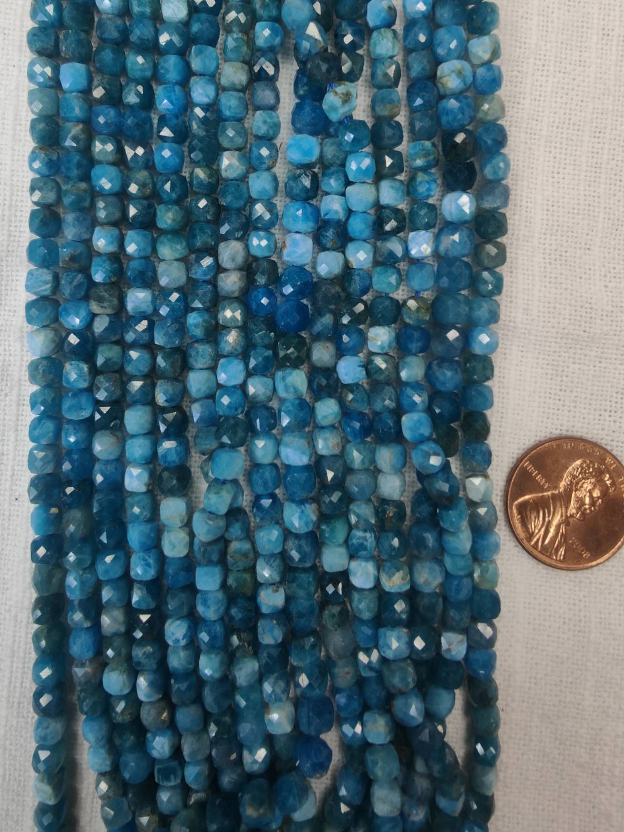 apatite 5mm cube shape faceted 15.5"strand