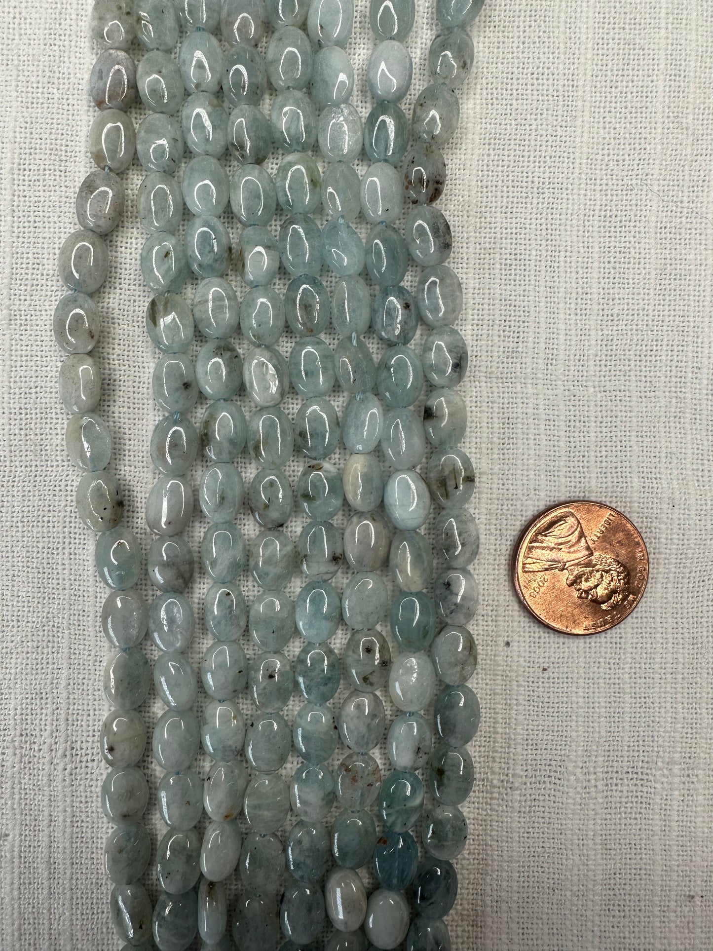 aquamarine 6.5mmx9mm oval shape  beads 15.5"strand