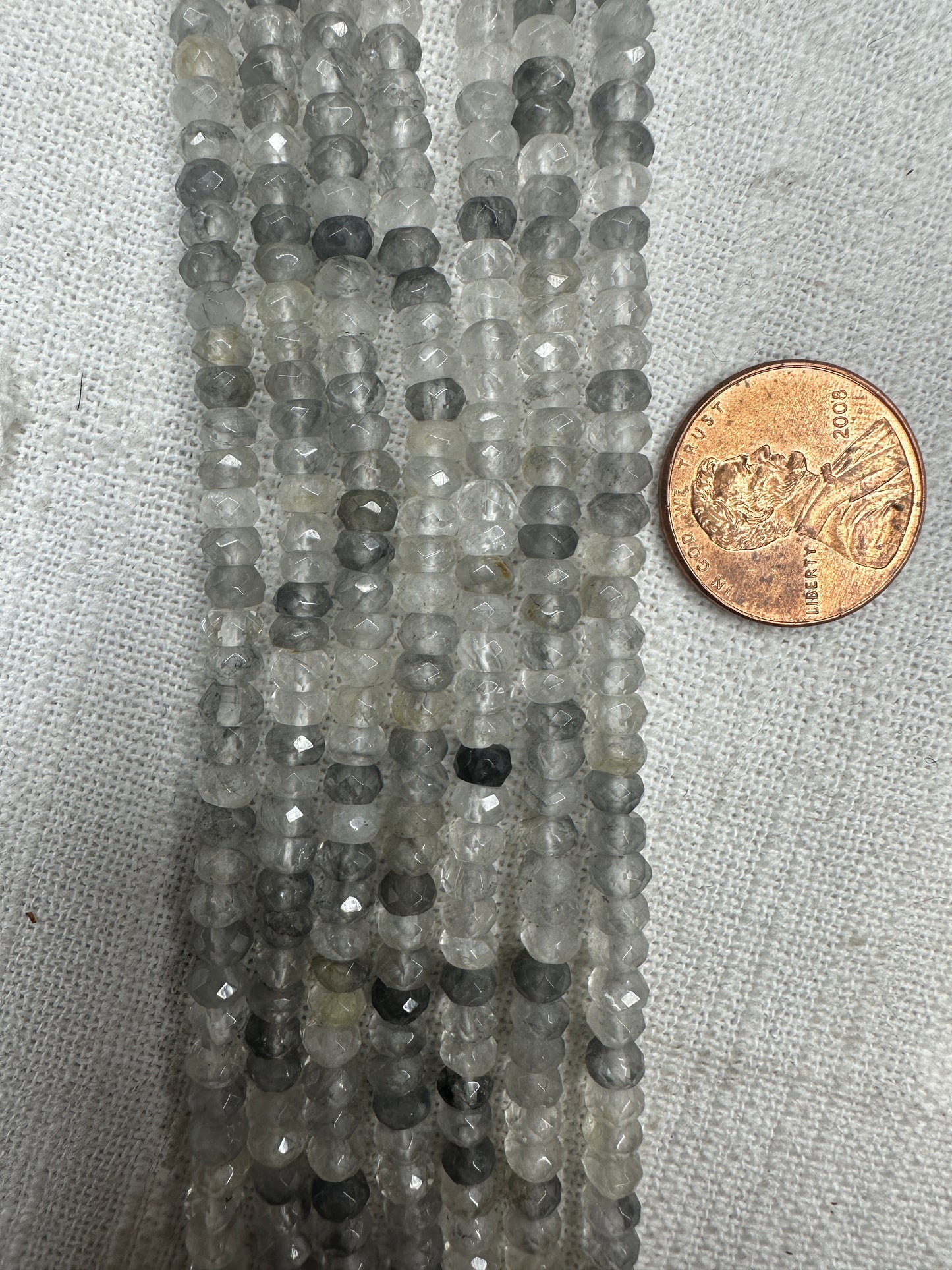 brazilian cloudy quartz 3mmx4.5mm rondelle shape faceted AAA grade 15.5"strand