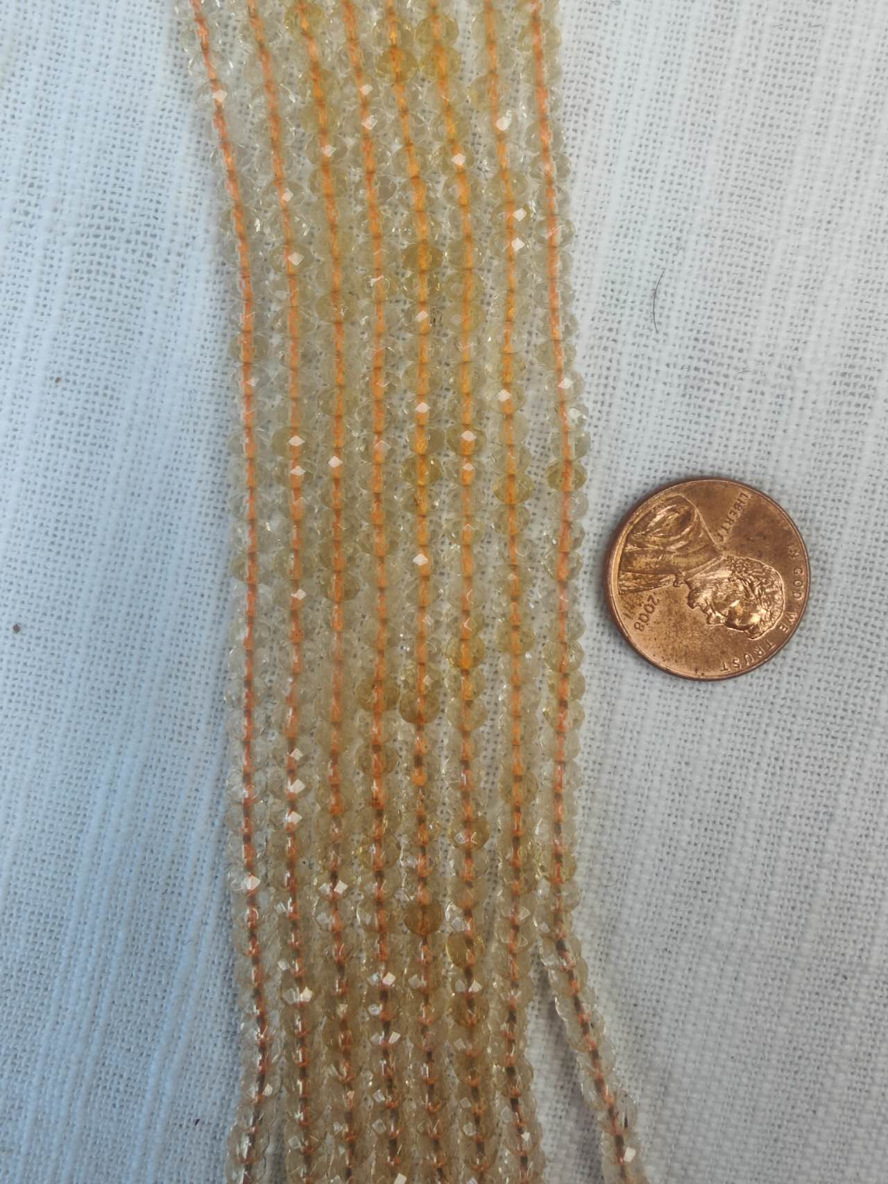 citrine rondelle faceted 3mmx4mm AAA grade 16"strand