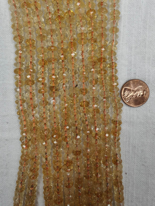 citrine rondelle faceted 4mmx7mm AAA grade 16"strand