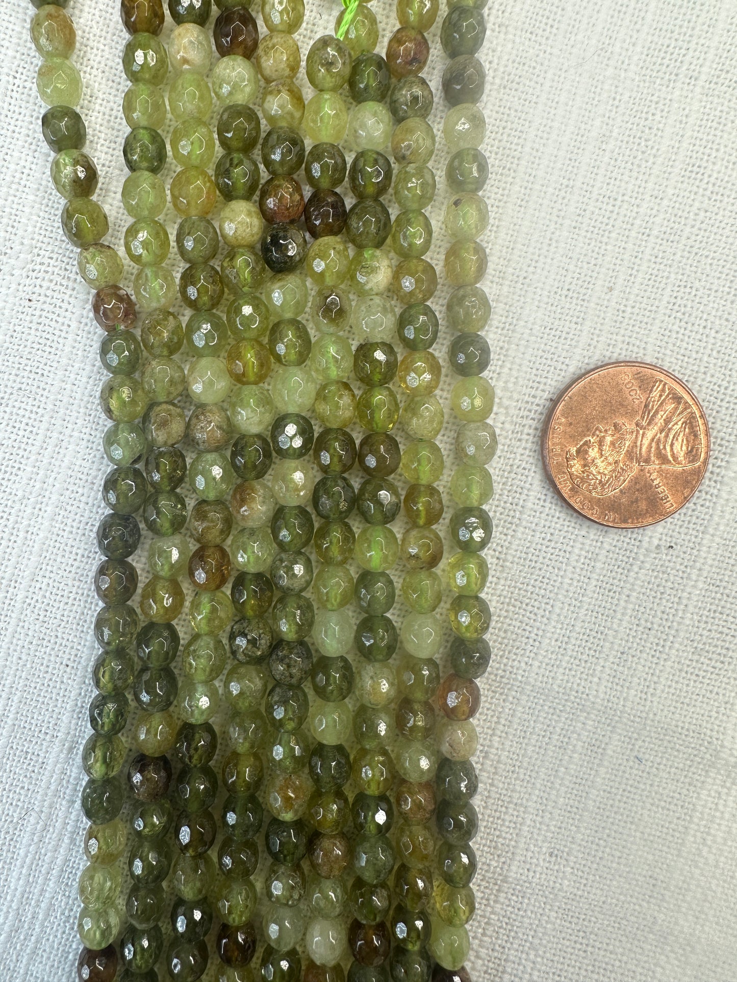 grossular green garnet 5mm round faceted shape 15.5"strand