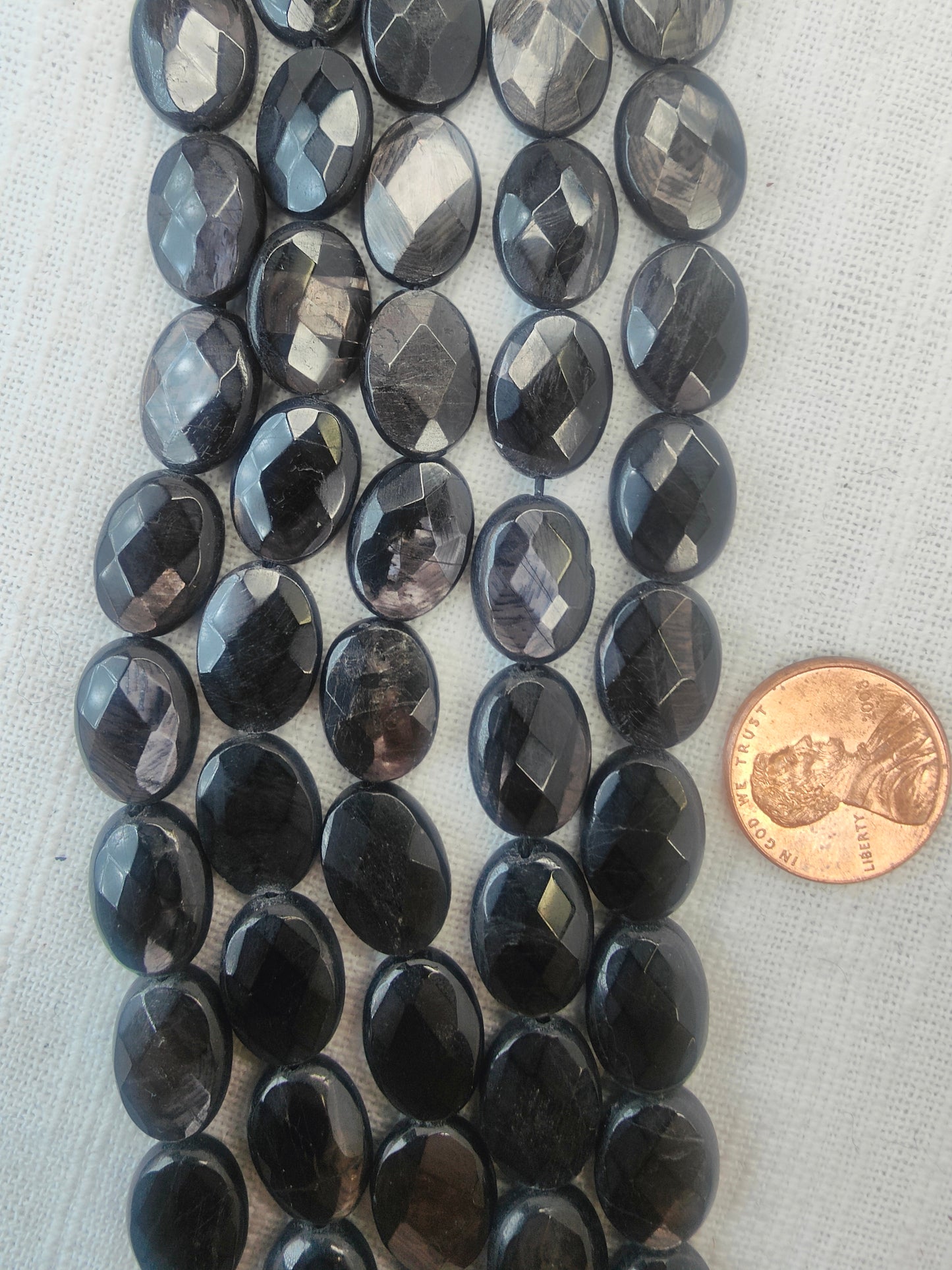 black aura hypersthene 10mmx14mm oval shape faceted AAA grade 15.5"strand