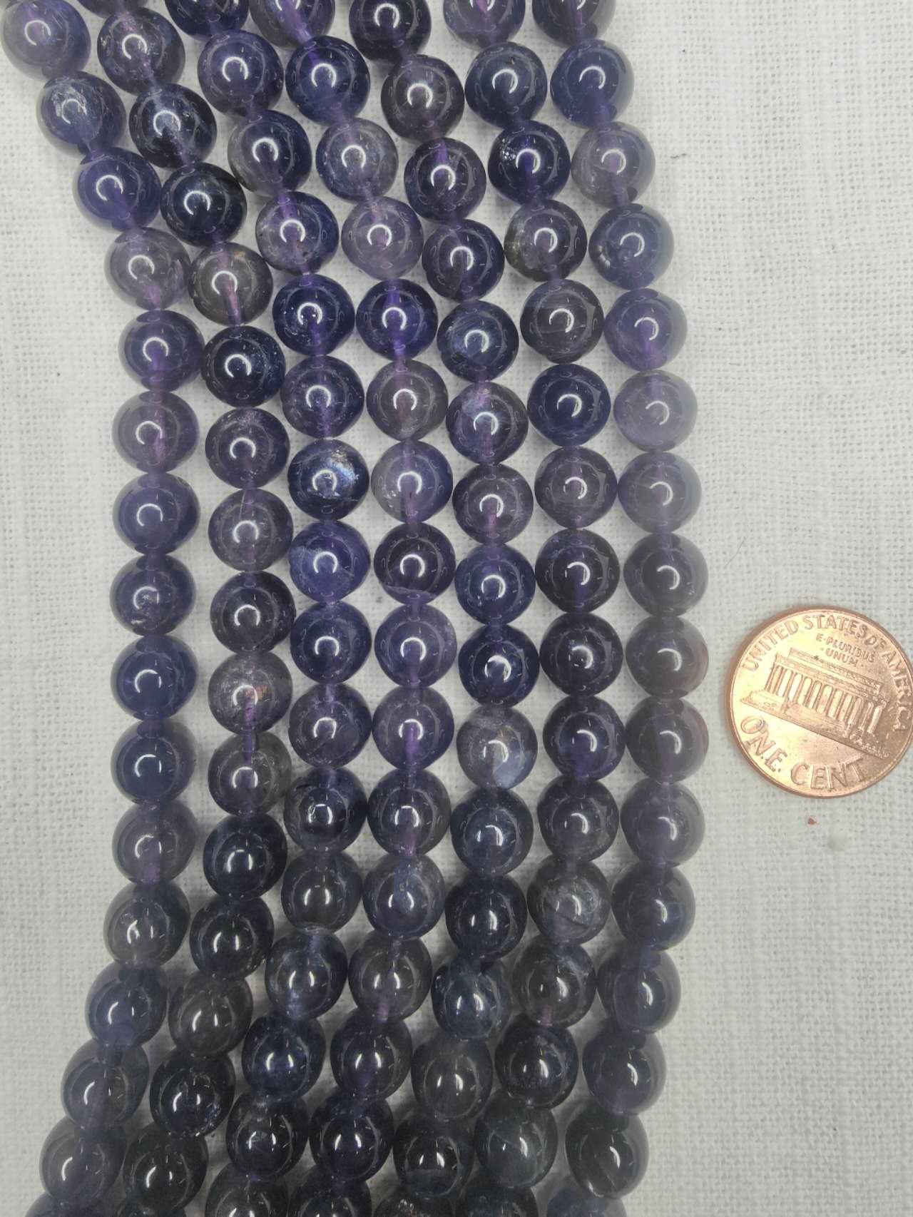 Iolite 8mm round beads AAA grade 15.5"strand