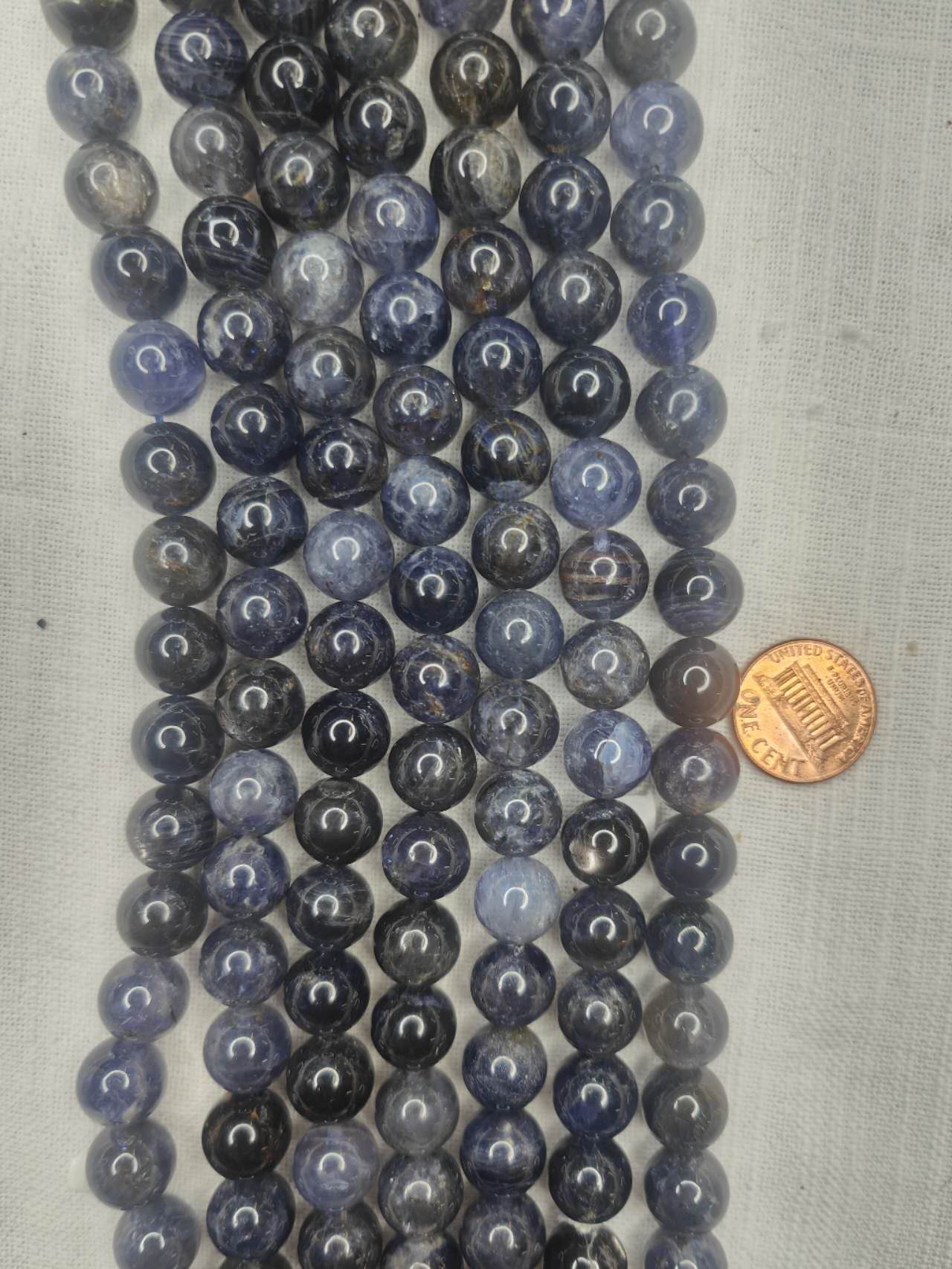 Iolite  11mm round AA grade beads 15.5"strand