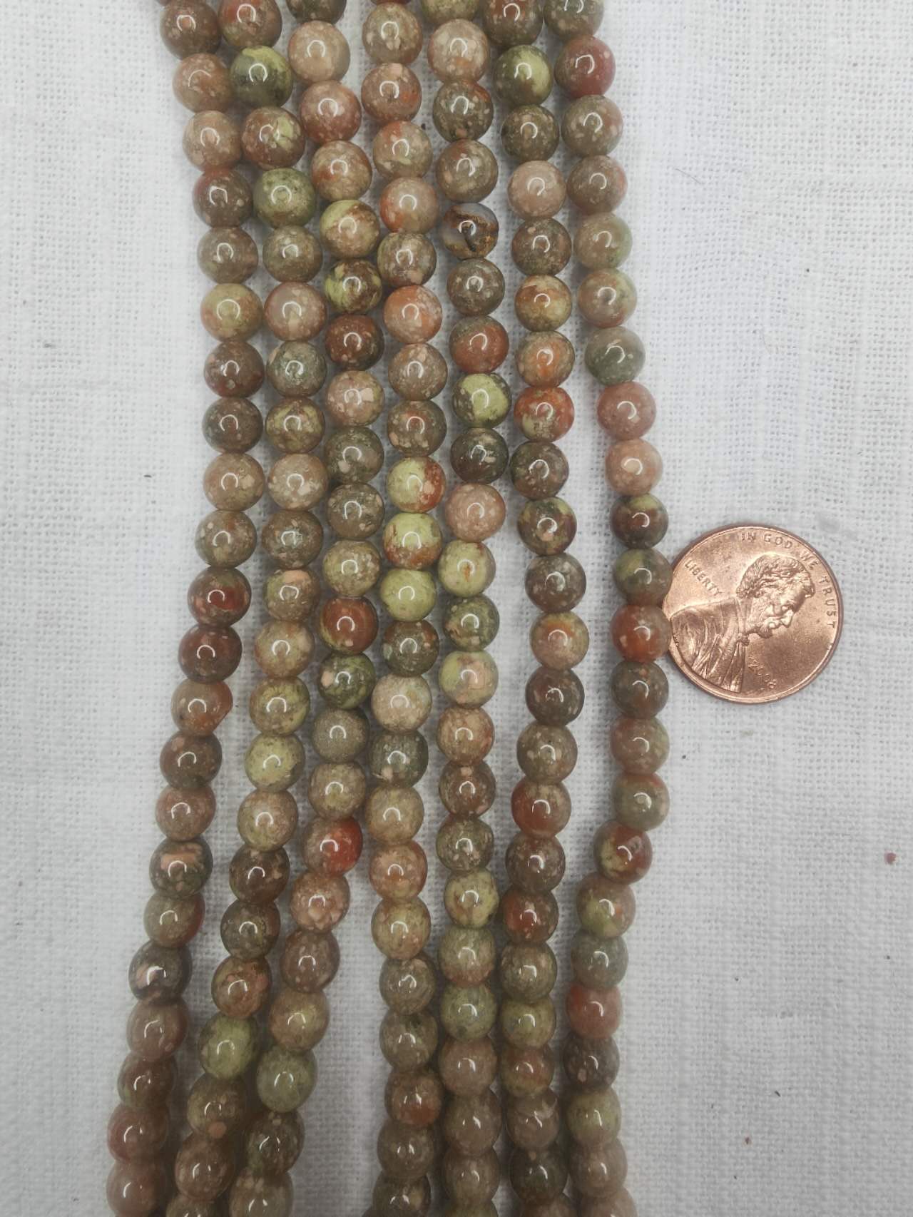 Kashgar Garnet 6mm round beads  AAA grade light color 15.5"strand