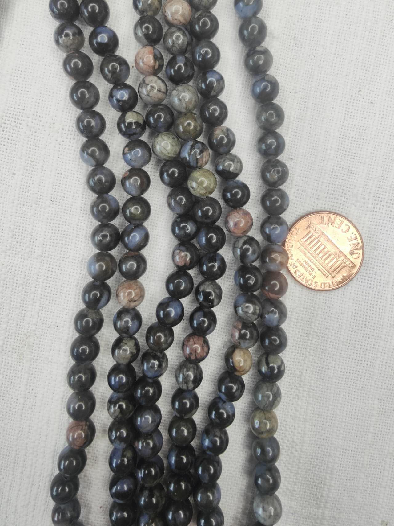 Llanite 6mm round beads AA grade 15.5" strand