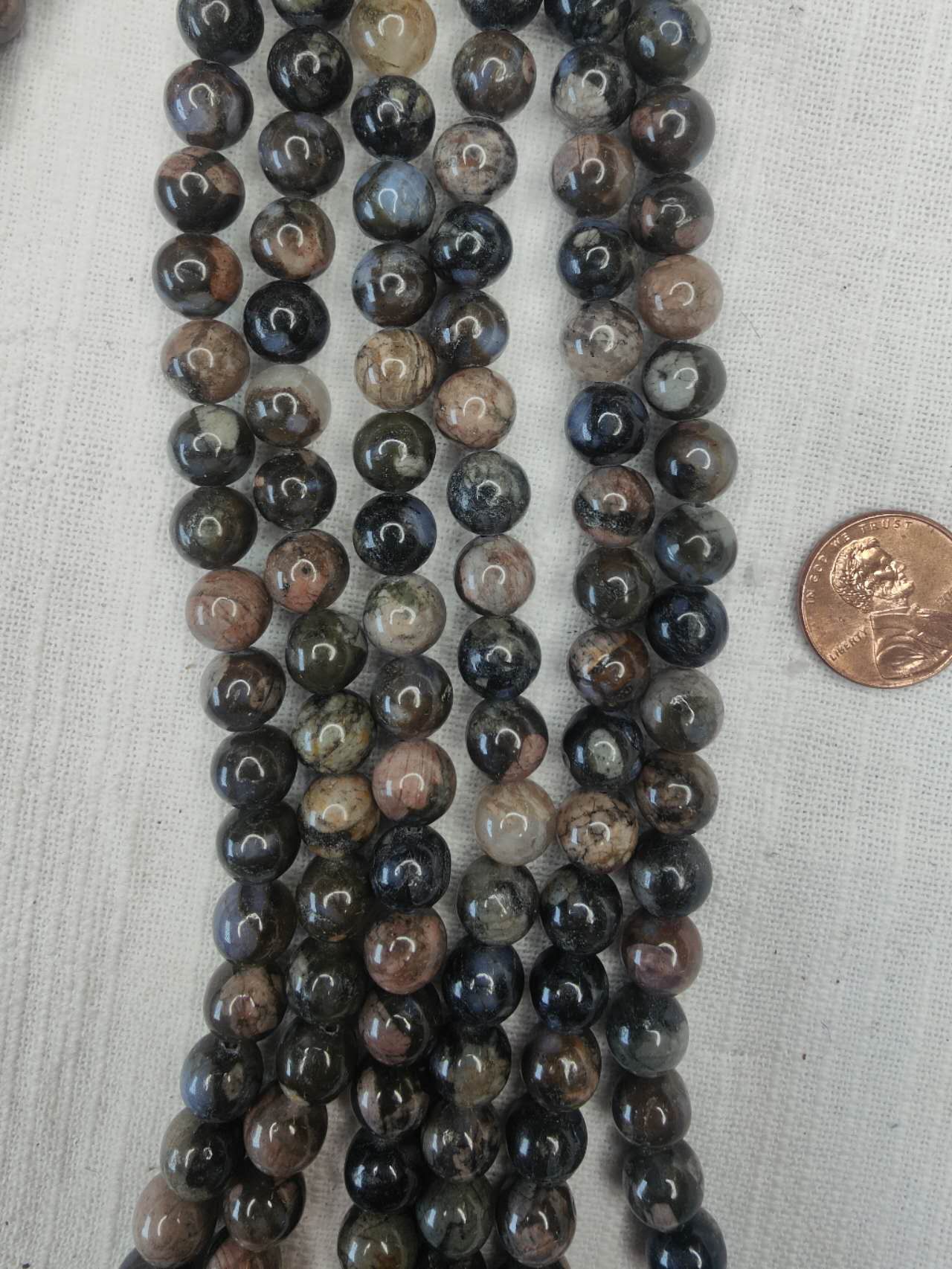 Llanite 8mm round beads 15.5"strand