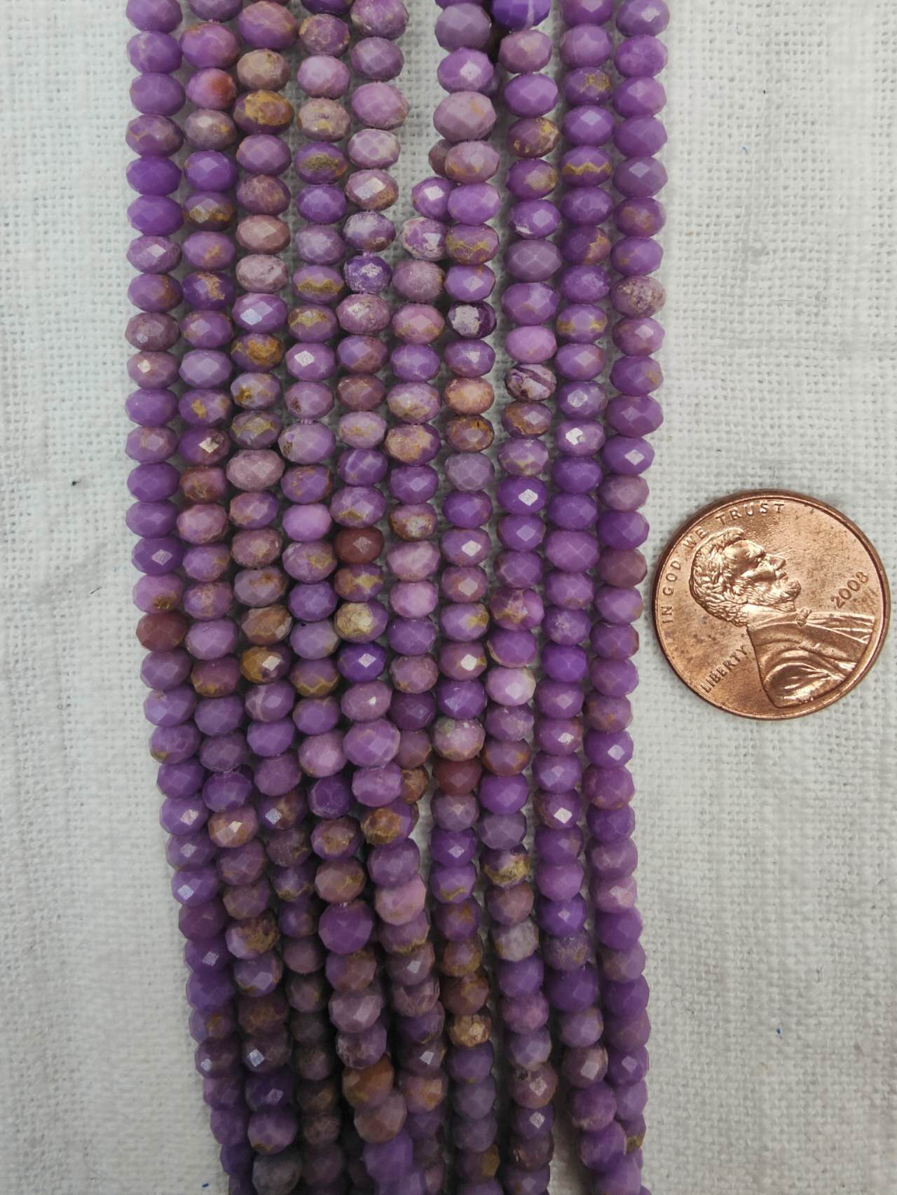 Phosphosiderite  3mmx4mm rondelle faceted AAA grade 15.5"strand