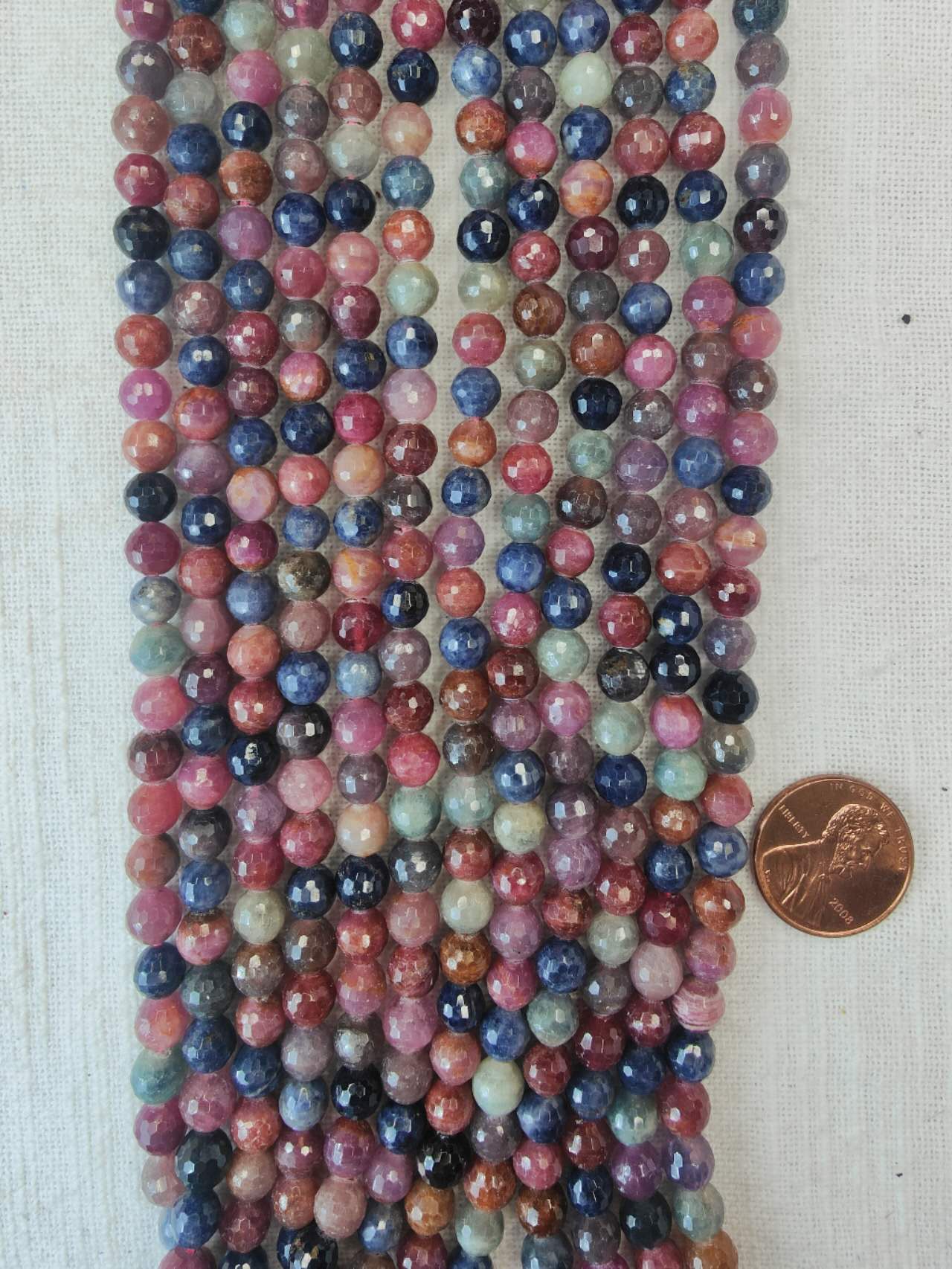 ruby and sapphire 6mm faceted beads 15.5"strand