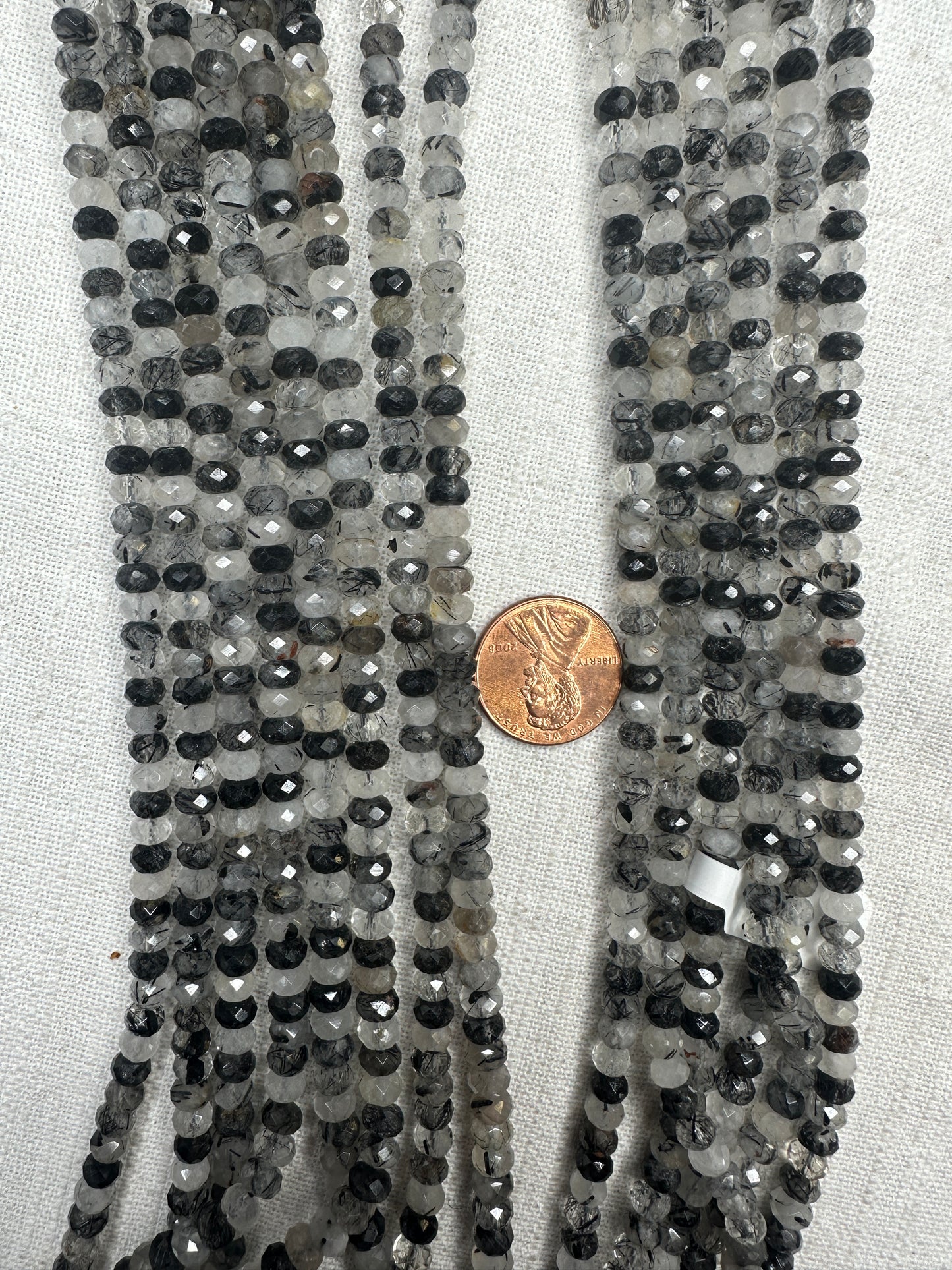 black tourmaline rutilated quartz 3mmx5mm 3mmx5.5mm rondelle shape faceted AAA grade 15.5"strand