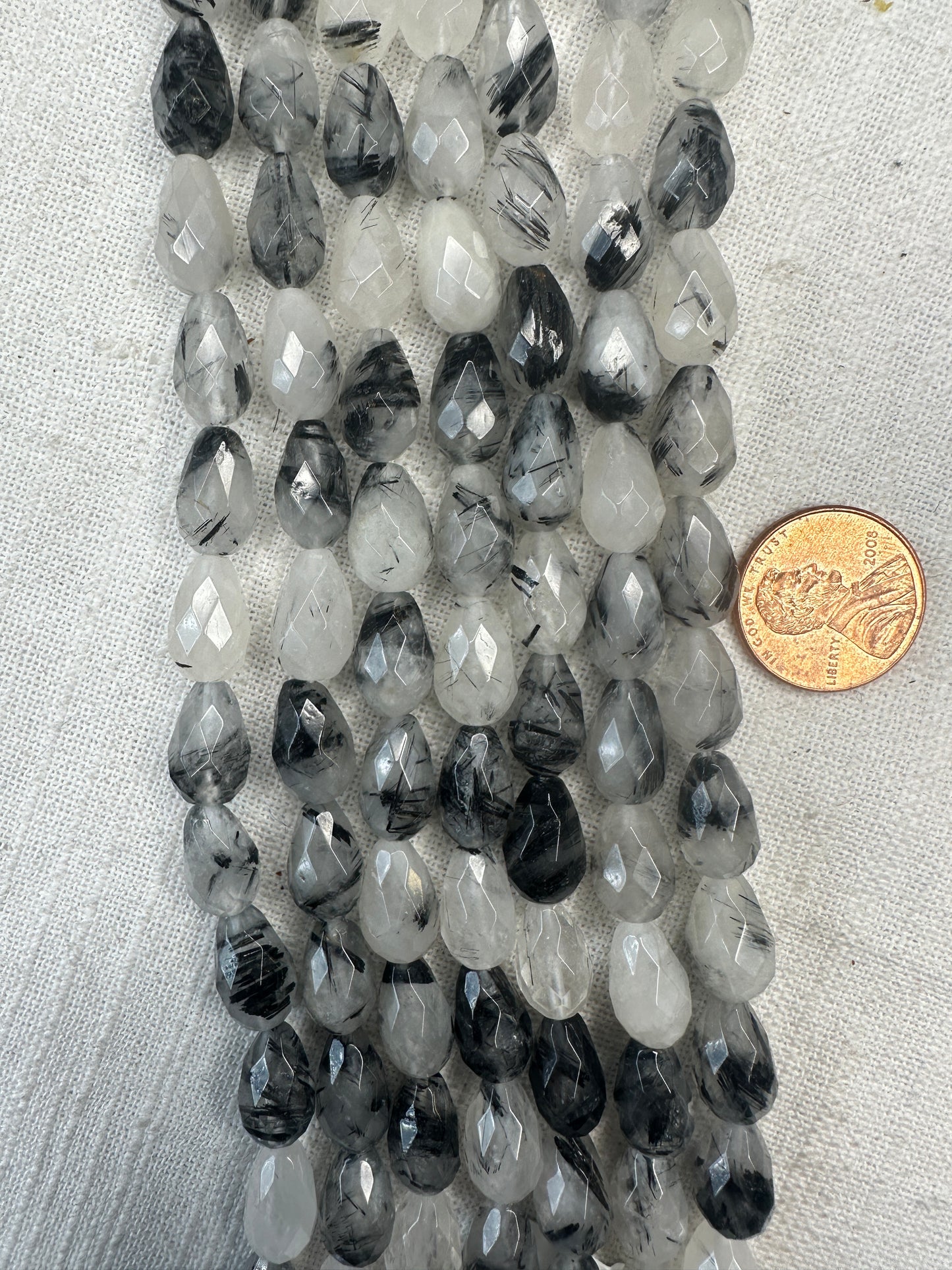 black tourmaline rutilated quartz 8mmx13mm teardrop shape faceted 15.5"strand