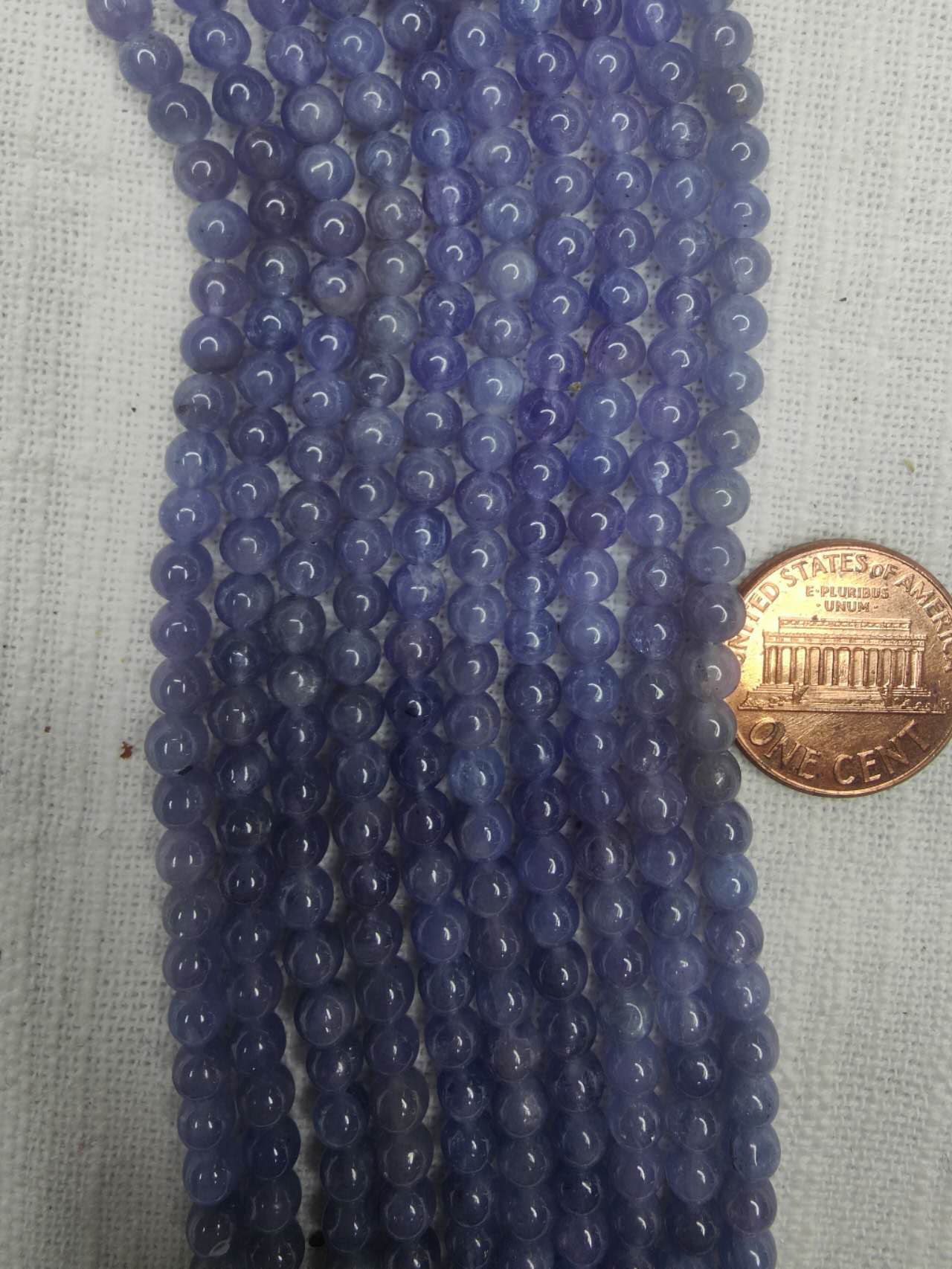 Tanzanite 4mm round beads AAA grade 15.5"strand