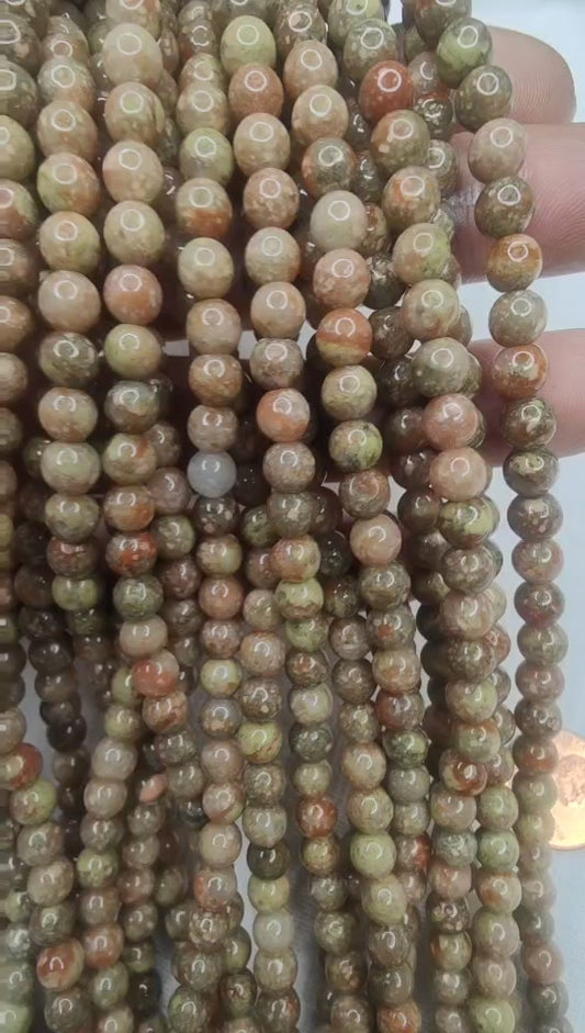 Kashgar Garnet 6mm round beads  AAA grade light color 15.5"strand