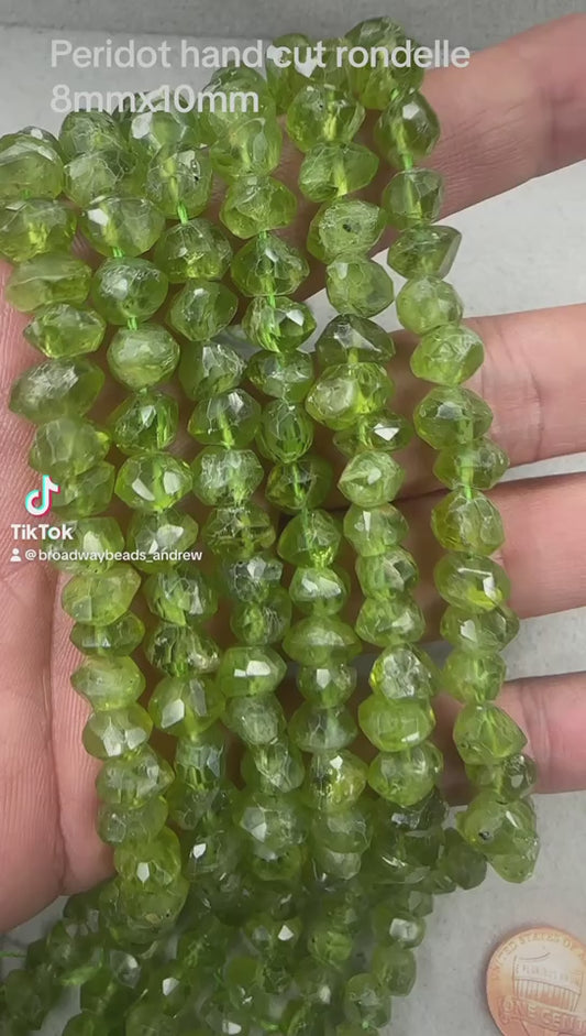 peridot rondelle hand cut faceted AAA grade 8mmx10mm 16"strand