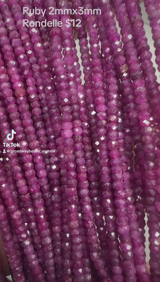 ruby 2mmx3mm rondelle faceted 16"strand